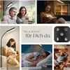 A collage of images showing a floor lamp in various settings and use cases, along with a remote control and text. Náhled obrázku produktu