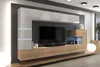 A modern living room wall unit with a TV, shelves, and cabinets. Voir les images du produit