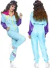 A woman modeling an 80s-style tracksuit. Produktbild-Vorschau