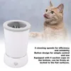 A white pet paw cleaner is shown next to a cat. Voir les images du produit