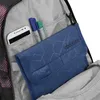 Close-up view of the interior of a backpack, showing various compartments and items. Náhľad obrázku produktu