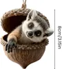 A cute lemur peeking out of an acorn-shaped ornament. Produktbild-Vorschau