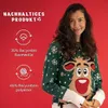 A woman is wearing a green Christmas sweater with a reindeer design. The background is red, and there are informational graphics on the left side. Produktbild-Vorschau