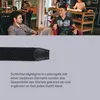 Two men are sitting in a cafe-like setting, one of them is talking and gesturing. Below them is a close-up of a black braided belt. Produktbild-Vorschau