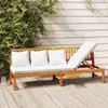 A wooden outdoor daybed with white cushions is shown on a wooden deck. Produktbild-Vorschau