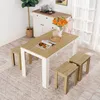 A dining table set with stools in a room with a cabinet and a plant. Náhled obrázku produktu