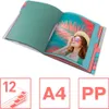An open binder with a picture of a woman on one page and a teal page on the other, with icons below. Podgląd zdjęcia produktu