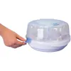 A hand is shown operating a baby bottle sterilizer. Náhľad obrázku produktu