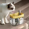 A cat drinks water from a pet water fountain. Produktbild-Vorschau