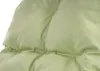 A close-up view of a green cushion or pillow with tufted stitching. Náhled obrázku produktu