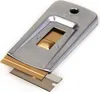 A close-up, studio shot of a window scraper tool with replacement blades. Voir les images du produit