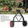 A person is using a string trimmer with a support wheel attachment in a garden. Náhled obrázku produktu