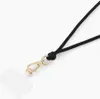 iDeal of Sweden Phone Cord Strap Universal - Black Productafbeelding-voorbeeld 7