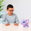 A young boy is playing with a toy elephant. Anteprima dell’immagine prodotto