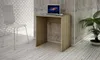 A small wooden desk with a laptop on it, placed in a room with brick and concrete walls and a wooden floor. Produktbild-Vorschau