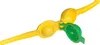 A yellow and green manual citrus juicer on a white background. Produktbild-Vorschau