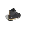 A single Adidas Terrex Climawarm Snowpitch boot is shown from a rear-side angle against a white background. Podgląd zdjęcia produktu
