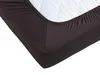 A close-up view of a dark brown fitted sheet on a mattress. Produktbild-Vorschau