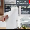 A hand is shown pulling a sheet of paper towel from a holder, with text overlays describing the product's features. Podgląd zdjęcia produktu