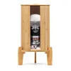 A water filter in a wooden stand against a white background. Produktbild-Vorschau