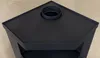 A close-up view of the top of a black corner fireplace. Náhled obrázku produktu