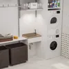 A laundry room with a sink, washing machine, dryer, and laundry baskets. Náhľad obrázku produktu