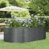A raised garden bed filled with hydrangeas sits on a lawn, with a patio umbrella and outdoor furniture in the background. Voir les images du produit