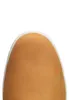A close-up view of the toe of a brown shoe with a white sole. Produktbild-Vorschau