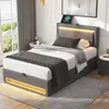 A modern bedroom with a gray upholstered bed. Náhľad obrázku produktu