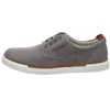 A side view of a gray men's shoe on a white background. Produktbild-Vorschau