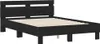 A black wooden bed frame with a slatted base is shown against a white background. Anteprima dell’immagine prodotto