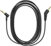 A black audio cable with gold connectors is coiled on a white background. Produktbild-Vorschau