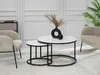 A modern living room setting with a nesting coffee table set, chairs, and a plant. Náhľad obrázku produktu