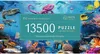 An underwater scene with various sea creatures, coral reefs, and a treasure chest, with a prominent overlay displaying product information. Produktbild-Vorschau