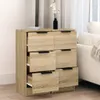 A wooden sideboard with multiple drawers is shown in a room with curtains and a sofa in the background. Anteprima dell’immagine prodotto