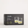 A black box containing two whisky glasses filled with a golden liquid and ice. Podgląd zdjęcia produktu