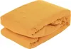 A folded duvet cover in a mustard yellow color. Voir les images du produit