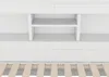 A close-up view of a white bed frame with shelves and drawers. Náhled obrázku produktu