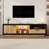 A modern TV cabinet with a television mounted above it, set in a living room environment. Anteprima dell’immagine prodotto