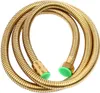 A coiled golden shower hose with green caps on the ends, isolated on a white background. Podgląd zdjęcia produktu