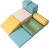 A collection of soft foam building blocks in pastel colors arranged in a playful, abstract formation. Produktbild-Vorschau