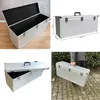 A collage of images showing a silver storage case from different angles, including one with dimensions and one being carried by a person. Produktbild-Vorschau