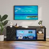 A modern black TV stand with marble-like accents and RGB LED lighting is displayed in a living room setting. Anteprima dell’immagine prodotto