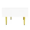 A white coffee table with gold legs on a white background. Produktbild-Vorschau