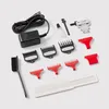 A collection of hair clipper attachments and accessories laid out on a white background. Produktbild-Vorschau