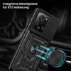 A black phone case with a ring holder and a magnetic mount is shown attached to a car's air vent. Produktbild-Vorschau