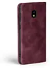 A burgundy flip case for a Samsung Galaxy J7 2017 phone is shown from the side against a white background. Produktbild-Vorschau
