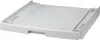 A white washing machine drawer accessory shown from a slightly elevated diagonal angle. Voir les images du produit