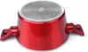 The underside of a red pot with silver accents on the bottom. Produktbild-Vorschau