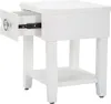 A white bedside table with one drawer partially open, shown against a white background. Náhled obrázku produktu
